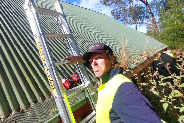 Local Gutter Cleaner Examines a Failed Gutter Guard in nowra
